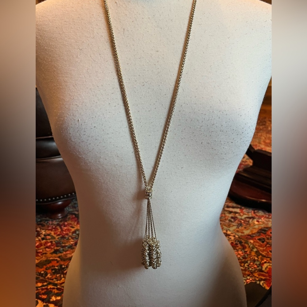 Classic and contemporary at the same time. Gold multi/tassel statement necklace